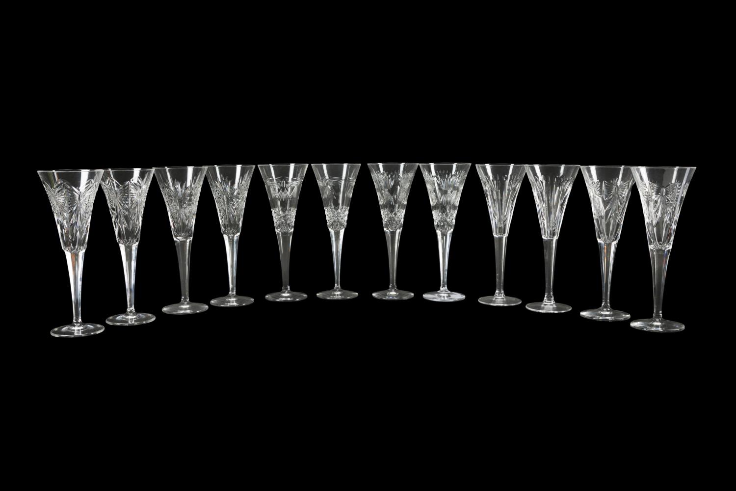 Appraisal: WATERFORD CRYSTAL MILLENNIUM COLLECTION FLUTES Twelve piece set of Waterford