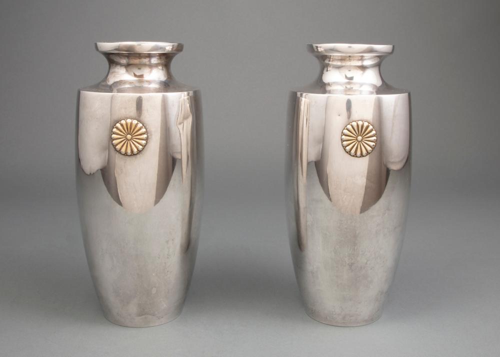 Appraisal: PAIR OF JAPANESE SILVER VASESPair of Japanese Silver Vases late