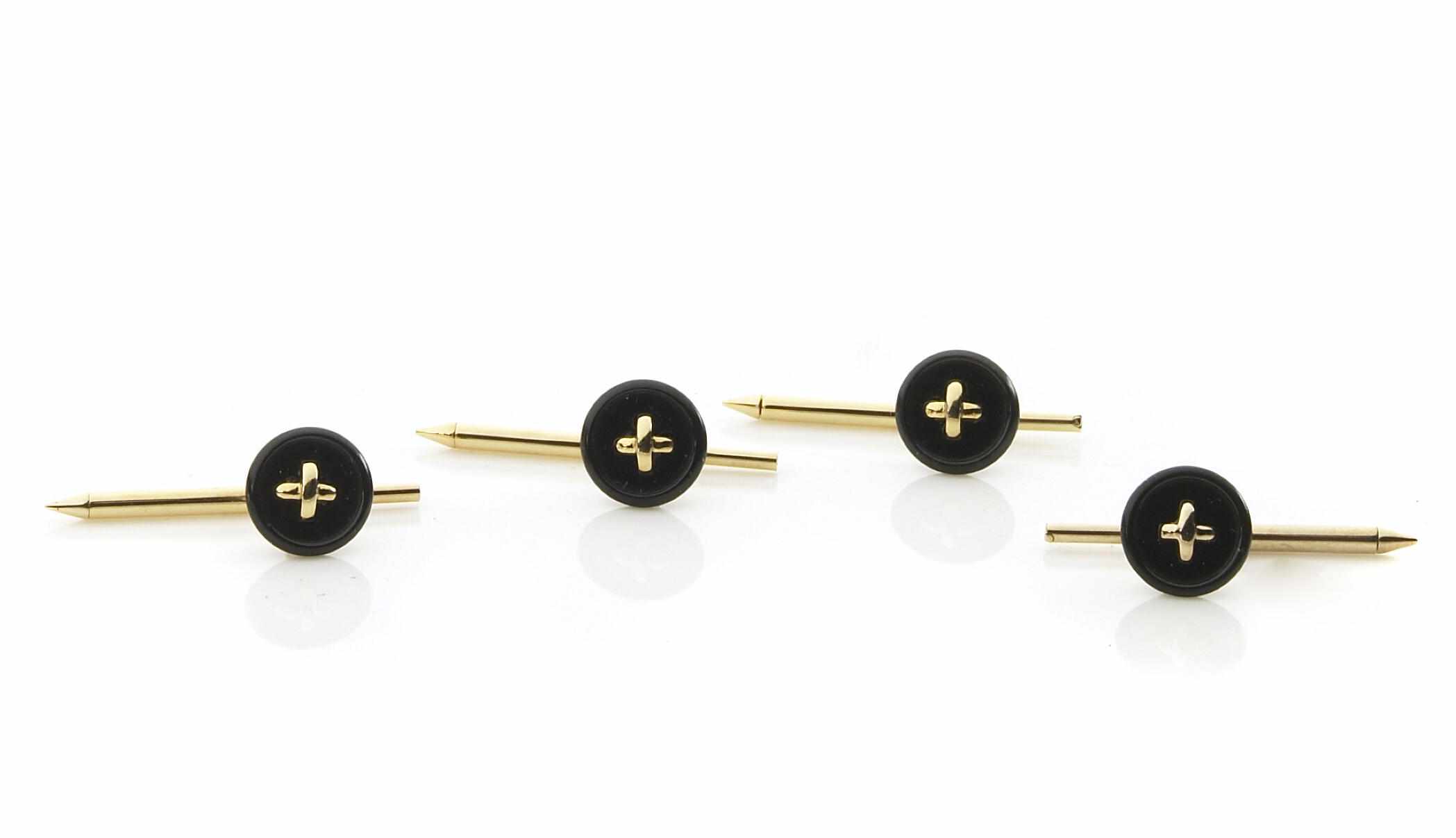 Appraisal: A set of black onyx and k gold shirt studs