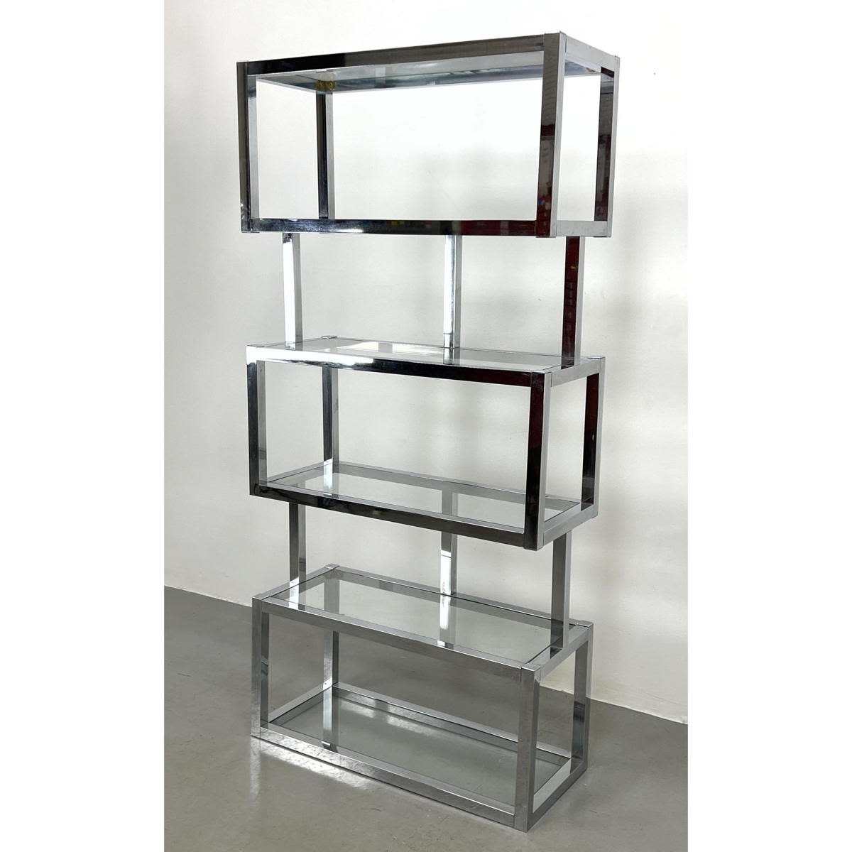 Appraisal: Stylish Stacked Form Chrome Etagere Modernist Display Shelves Glass shelves