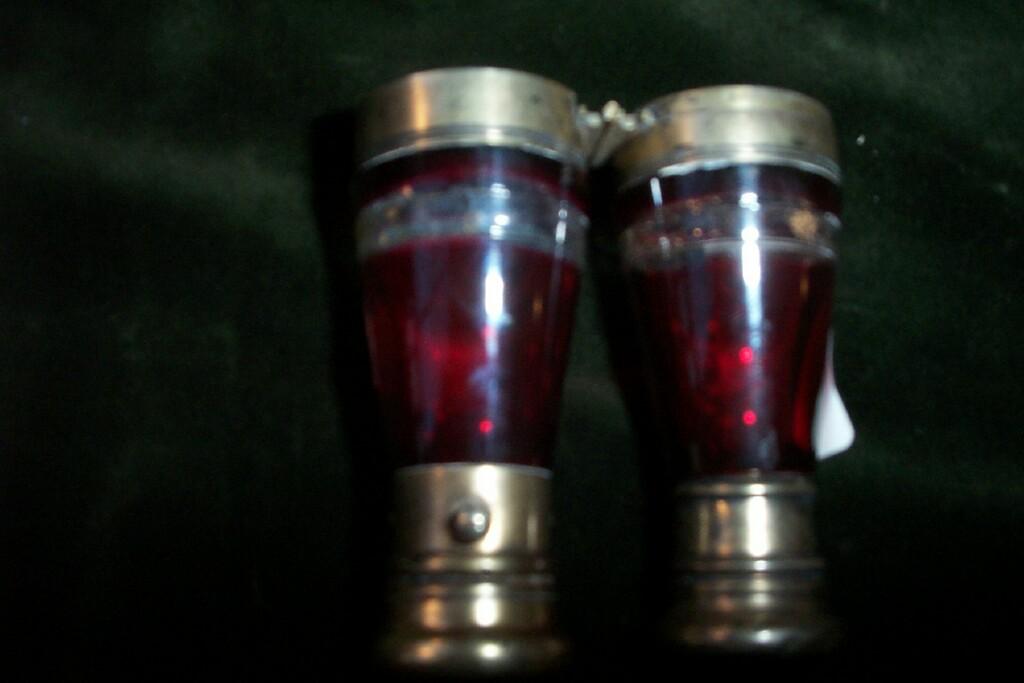 Appraisal: A Victorian cranberry glass double ended scent bottle of tapering