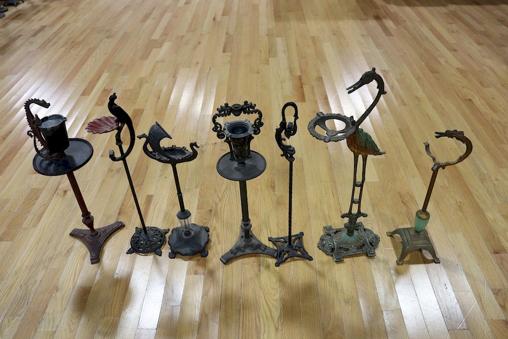 Appraisal: Cast Iron Metal Standing Ashtrays From the estate of Jerry