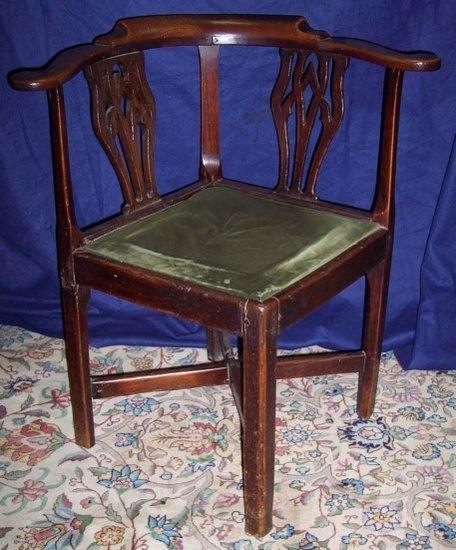 Appraisal: An early th Century corner chair with pierced twin splats