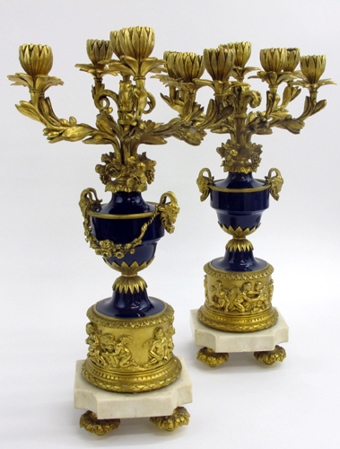 Appraisal: PAIR FRENCH GILT BRONZE COBALT BLUE CANDELABRA The -light candelabra