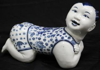 Appraisal: Chinese Blue White Porcelain Pillow Boy The kneeling smiling child