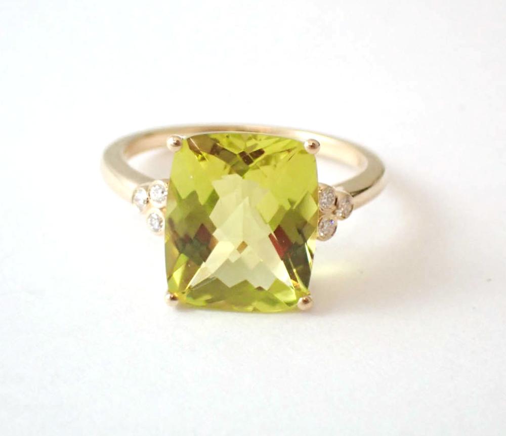 Appraisal: LEMON CITRINE DIAMOND AND FOURTEEN KARAT GOLD RING with three