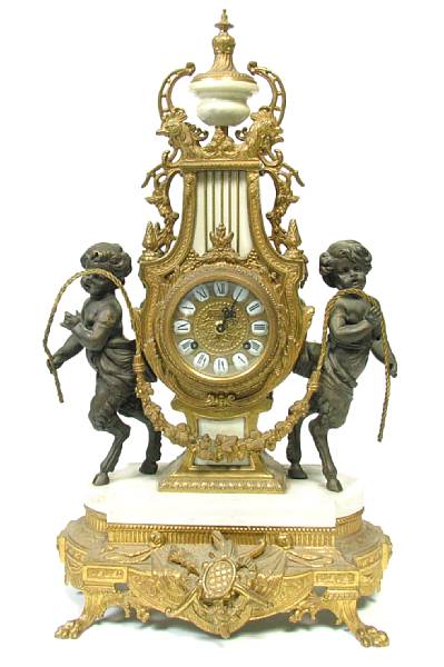 Appraisal: A gilt metal mounted mantel clock height in width in