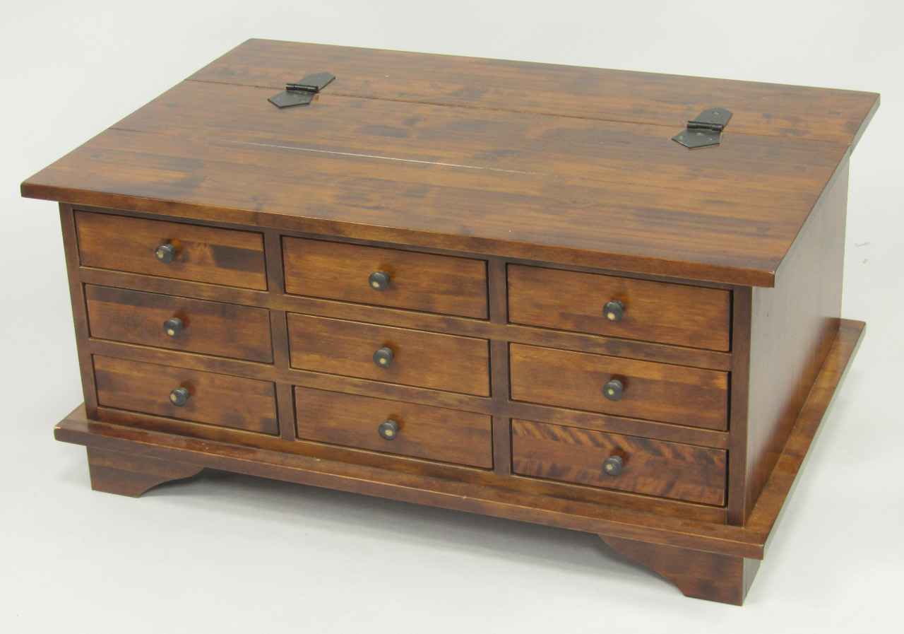 Appraisal: A mahogany chest with a lift up top to one