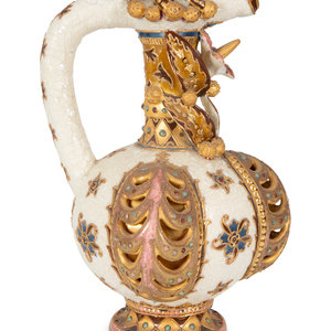 Appraisal: A Continental Polychrome and Gilt-Encrusted Porcelain Ewer TH CENTURY in