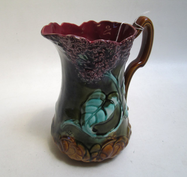 Appraisal: FRENCH MAJOLICA PITCHER Art Nouveau floral design by Frie Onnaing