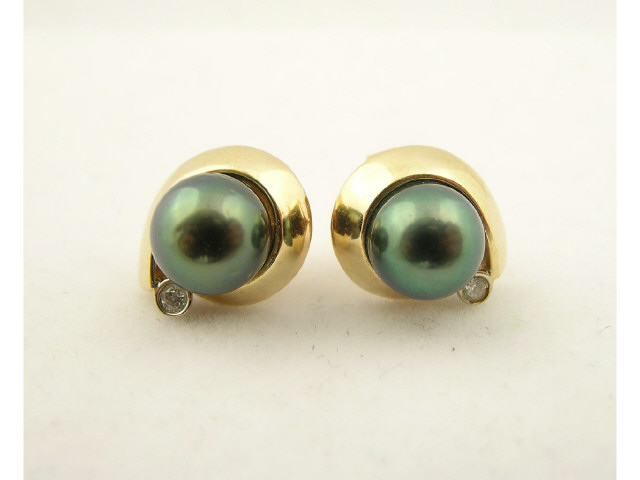 Appraisal: Pair of K yellow gold cultured pearl and diamond earrings