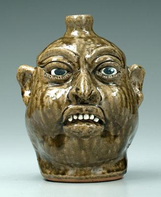 Appraisal: Dated Lanier Meaders face jug White County Georgia - runny