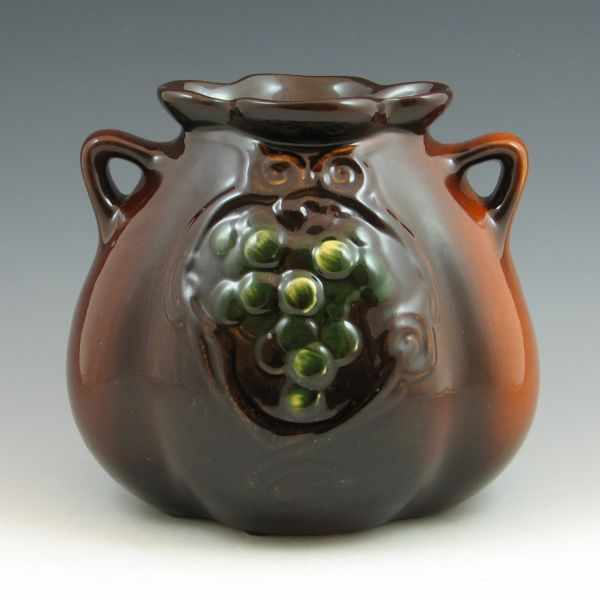 Appraisal: Weller Floretta pillow vase in brown Marked Weller Floretta Invisible