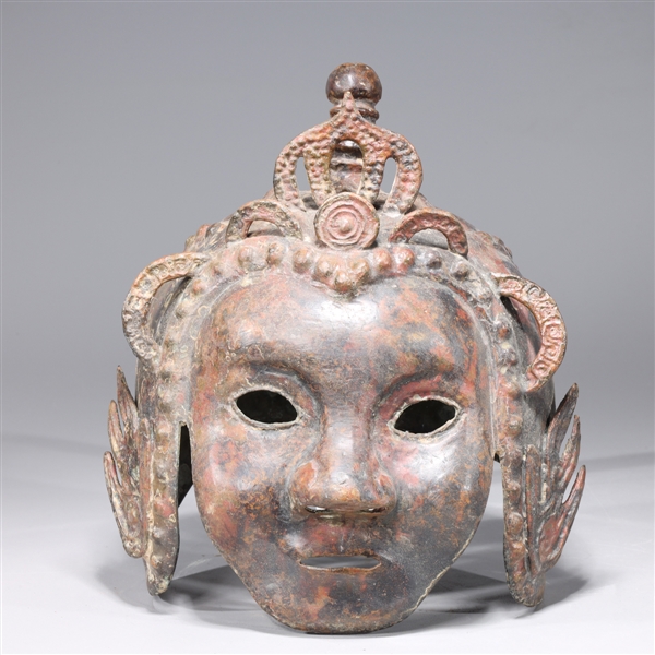 Appraisal: Chinese archaistic bronze metal mask-form helmet with molded designs overall