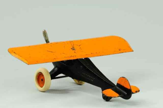 Appraisal: MONOCOUPE Arcade cast iron fuselage painted in black embossed ''Monocoupe''