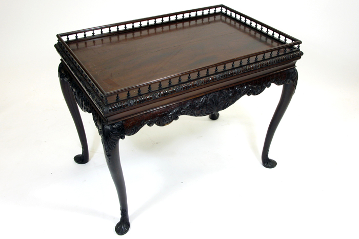 Appraisal: CHIPPENDALE PERIOD MAHOGANY TEA TABLE Irish late th century having