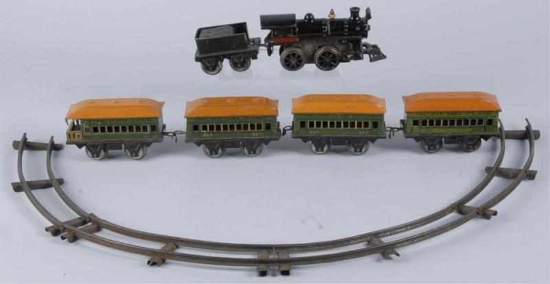 Appraisal: Tin Joy Line Clockwork Passenger Train Set Description Comes with