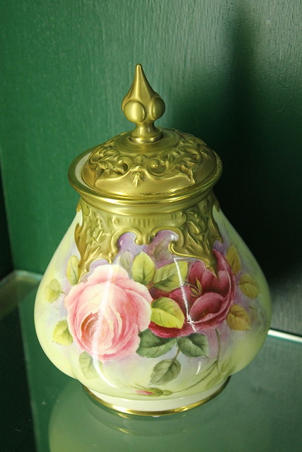 Appraisal: A ROYAL WORCESTER POT POURRI VASE and cover painted with