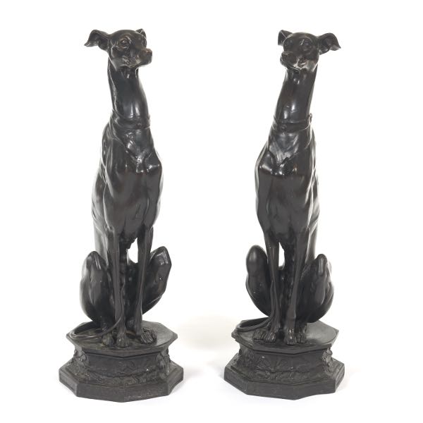 Appraisal: PAIR OF BRONZE GREYHOUND SCULPTURES A pair of seated upright