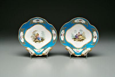 Appraisal: Pair S egrave vres shell bowls central hand painted cartouches