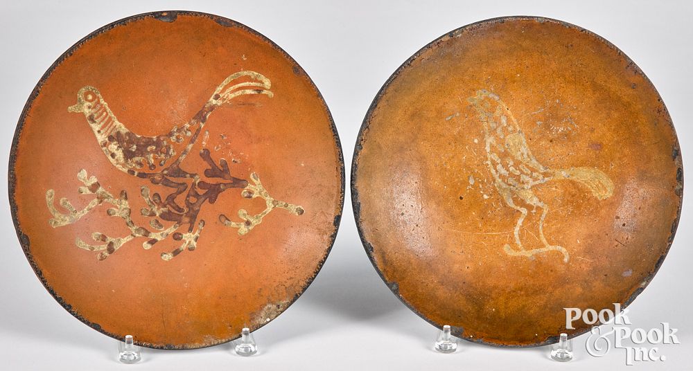 Appraisal: Two Pennsylvania redware chargers th c Two Pennsylvania redware chargers