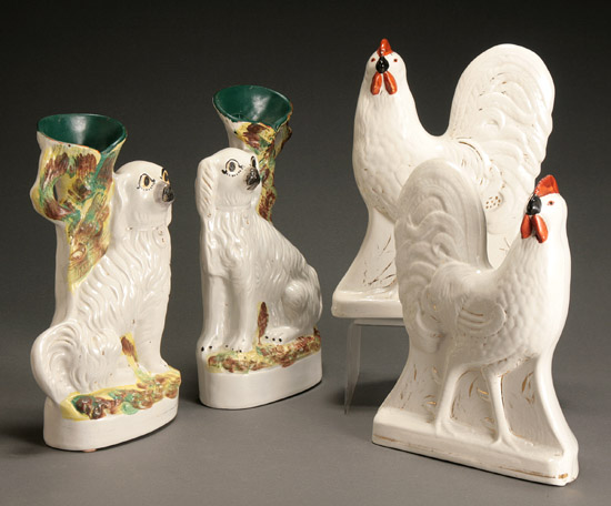 Appraisal: Pair of Staffordshire Spaniel Spill Vases and Pair of Roosters