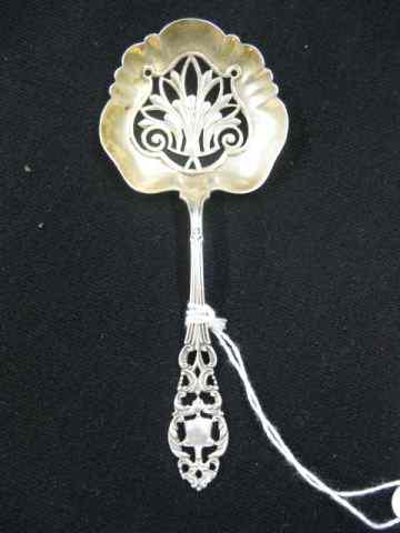 Appraisal: Victorian Sterling Silver Nut Spoon elaborate pierced gold washed bowl