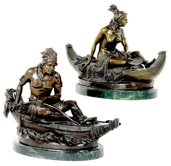 Appraisal: Pair Native American bronze figures canoeing male and female figures