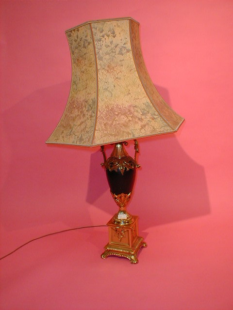 Appraisal: A reproduction ormolu table lamp and shade