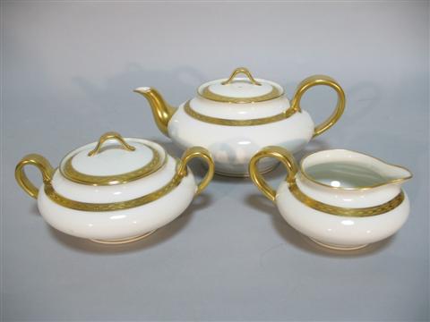 Appraisal: THEODORE HAVILAND LIMOGES TEA SET Comprising teapot cream and sugar