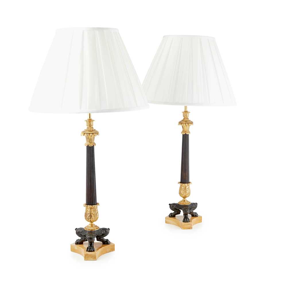 Appraisal: PAIR OF REGENCY PATINATED AND GILT BRONZE CANDLESTICK LAMPS TH