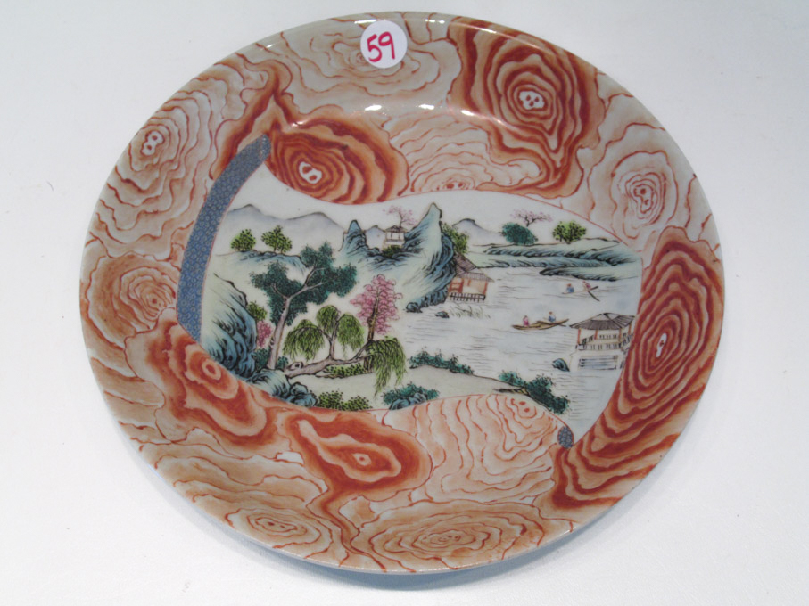 Appraisal: CHINESE PORCELAIN DISH with hand painted reserve decorated with a