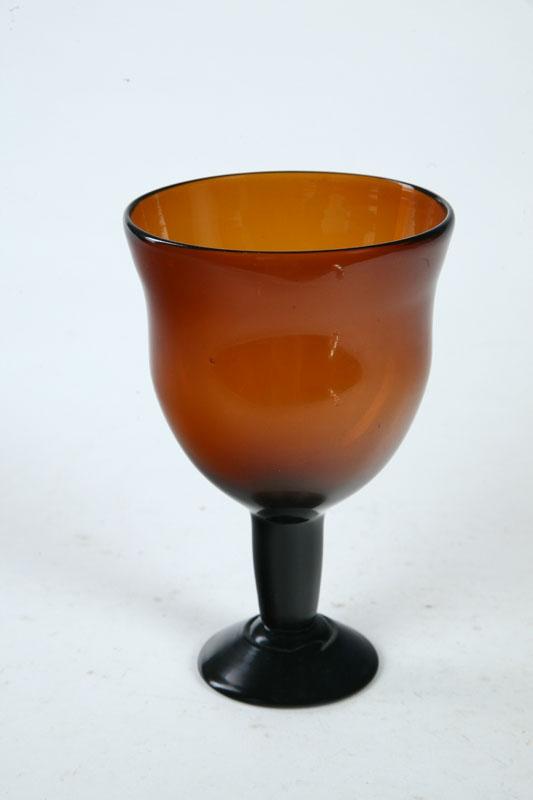 Appraisal: AMBER GLASS GOBLET American st half- th century blown glass