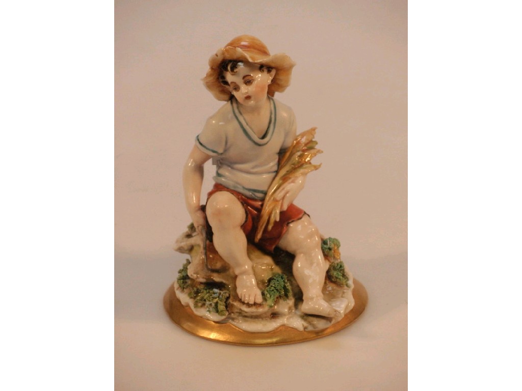 Appraisal: A Capo di Monte porcelain figure of a young farmers