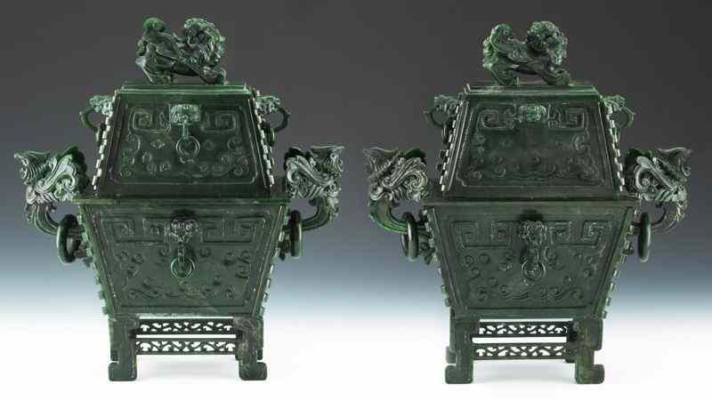 Appraisal: Pr Chinese carved spinach jade ding-shaped censereach with foo dog