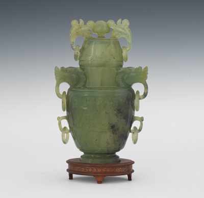 Appraisal: A Chinese Bowenite Lidded Vase with Zoomorphic Ring Handles Lidded