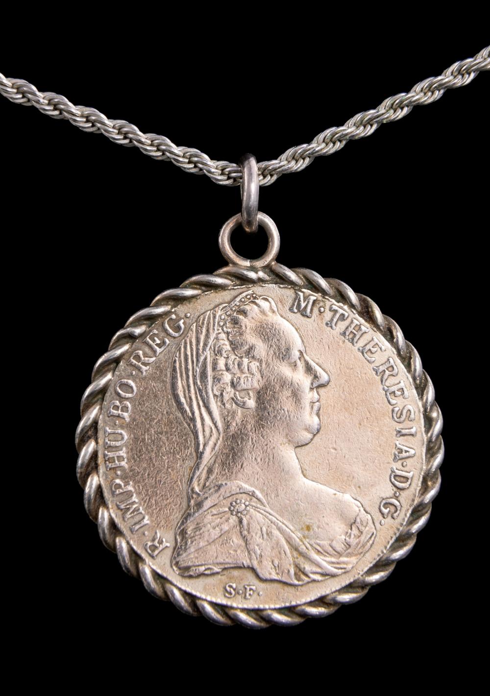 Appraisal: Austrian Maria Theresa Thaler Coin with rope bezel and rope