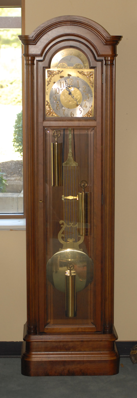 Appraisal: A Tall Case Clock by the Colonial Company with brass