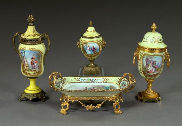 Appraisal: French Gilt-Brass-Mounted Pale Citron-Ground Porcelain Covered Two-Handled Garniture Vase first