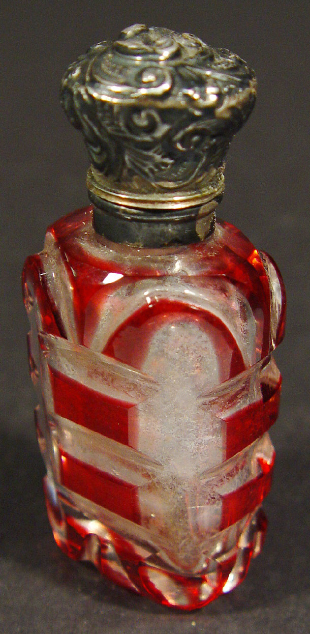 Appraisal: Red flashed cut glass scent bottle with floral embossed silver