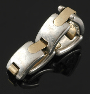 Appraisal: A gold and silver ring by Tiffany and Co Set