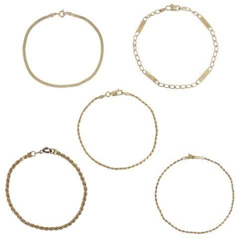 Appraisal: lot of Estate yellow gold bracelets varied chain patterns in