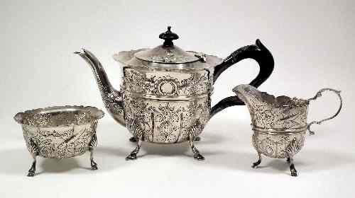 Appraisal: An Edward VII silver circular teapot with shaped rim moulded