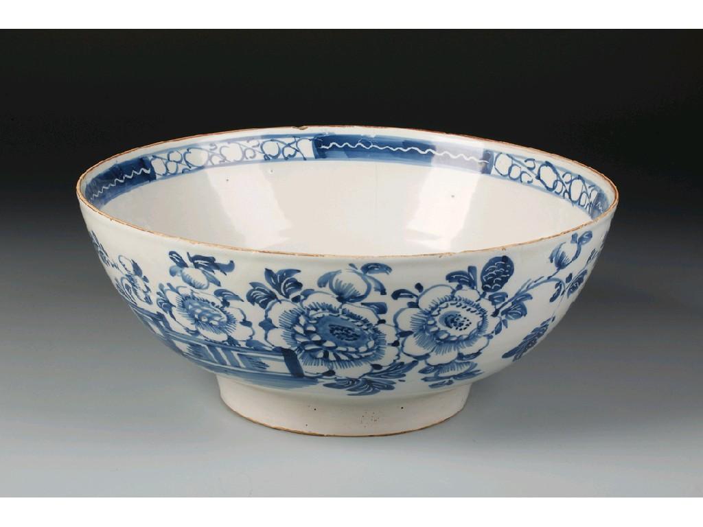 Appraisal: AN ENGLISH BLUE AND WHITE DELFTWARE PUNCHBOWL circa decorated with