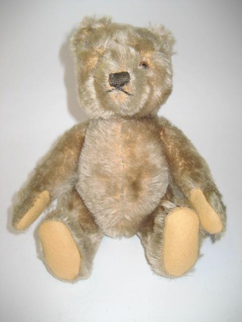 Appraisal: A Steiff teddy bear c - covered in fawn plush