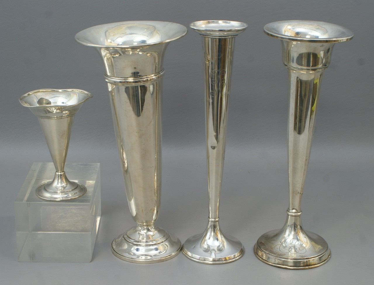 Appraisal: weighted sterling silver trumpet vases all with twist and dents