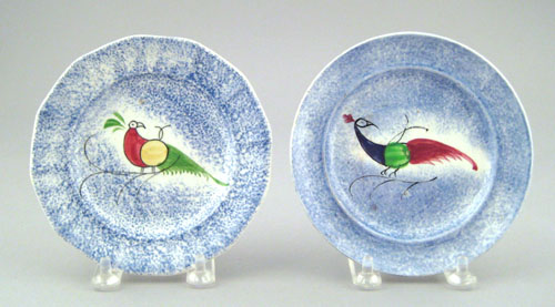 Appraisal: Two blue spatter toddy plates th c with peafowl dia