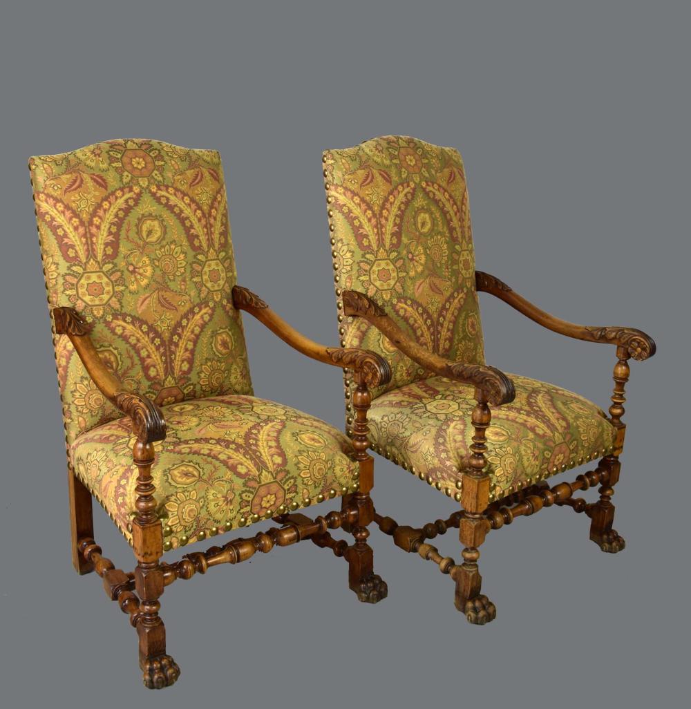 Appraisal: PAIR OF BAROQUE STYLE WALNUT ARMCHAIRS th Century The rectangular