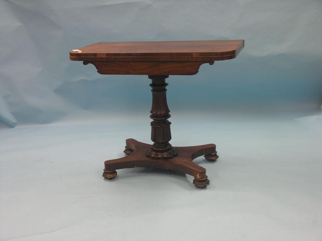 Appraisal: An early Victorian mahogany card table D-shape top on carved