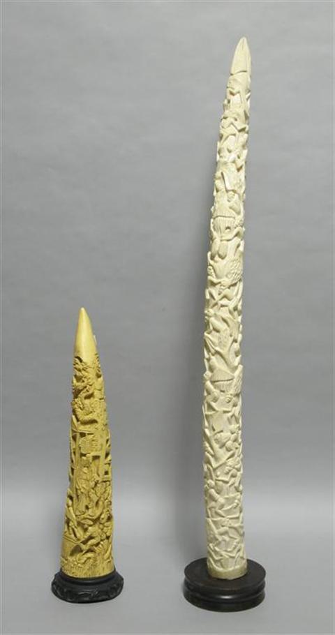 Appraisal: ONE LARGE HEAVILY CARVED AFRICAN IVORY TUSK Continuous scene of